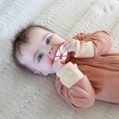 ReLIVE BPA-free silicone teether emphasizes safety and long-lasting use.