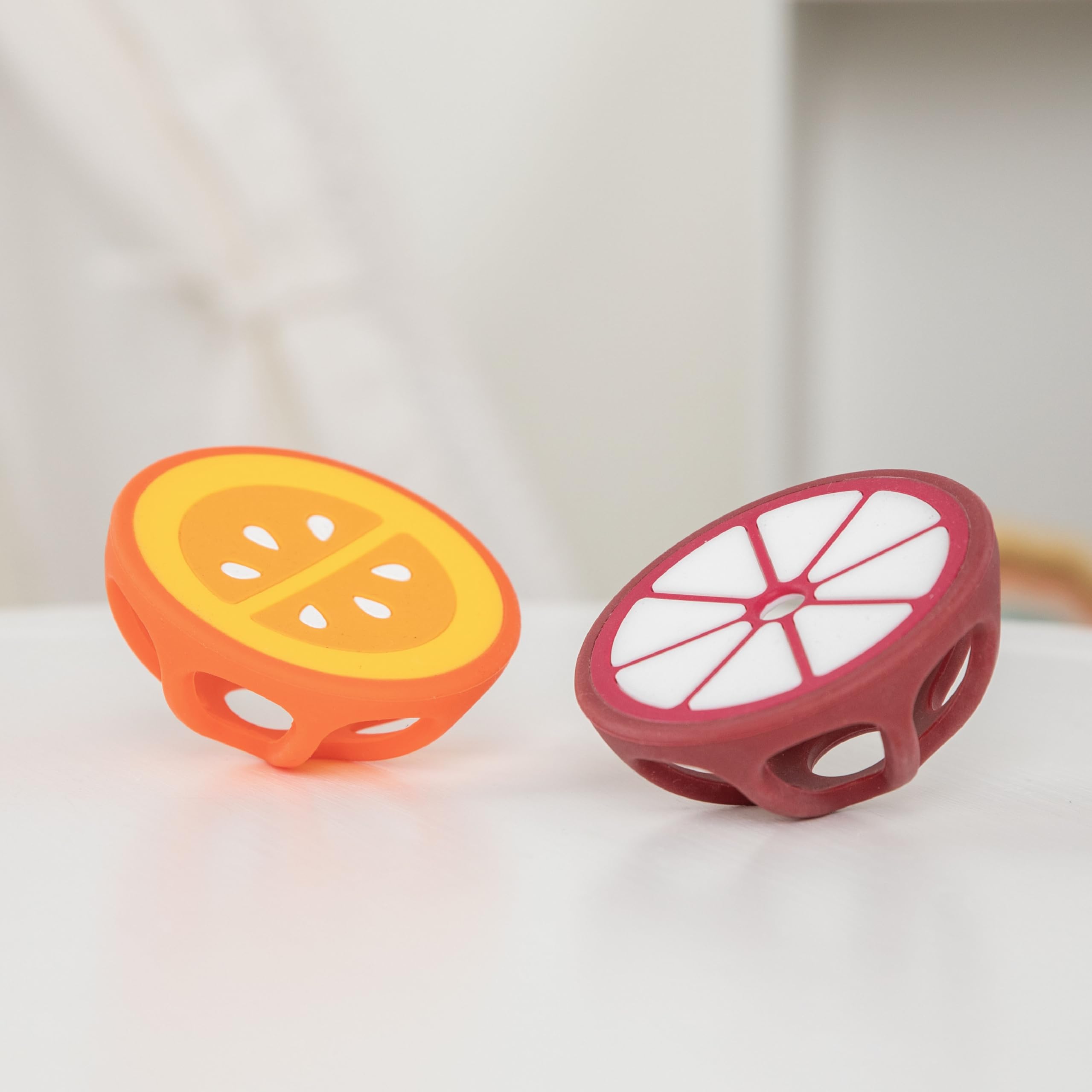 ReLIVE orange mangosteen teether shows colorful textures for chewing.