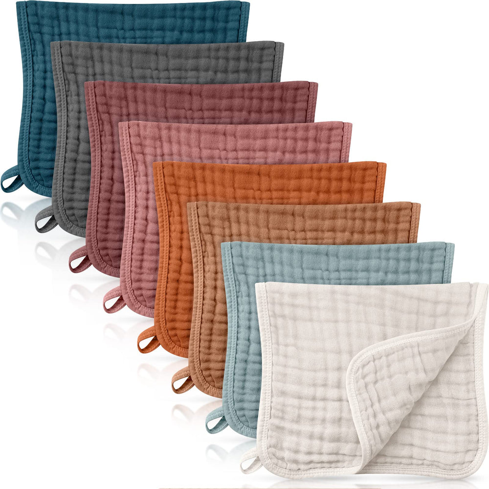 Remagr 8-pack muslin burp cloths, folded soft cotton for gentle baby care.