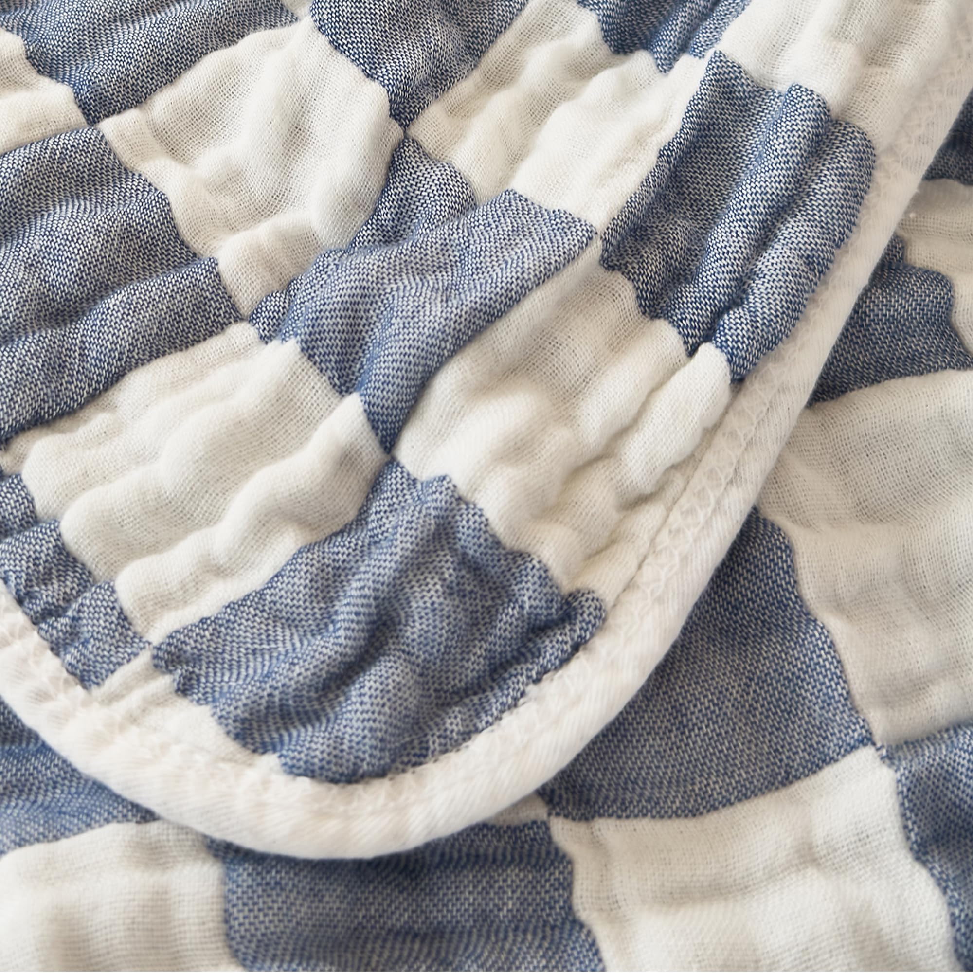 REPRECONF muslin blanket tummy-time mat for soft play.