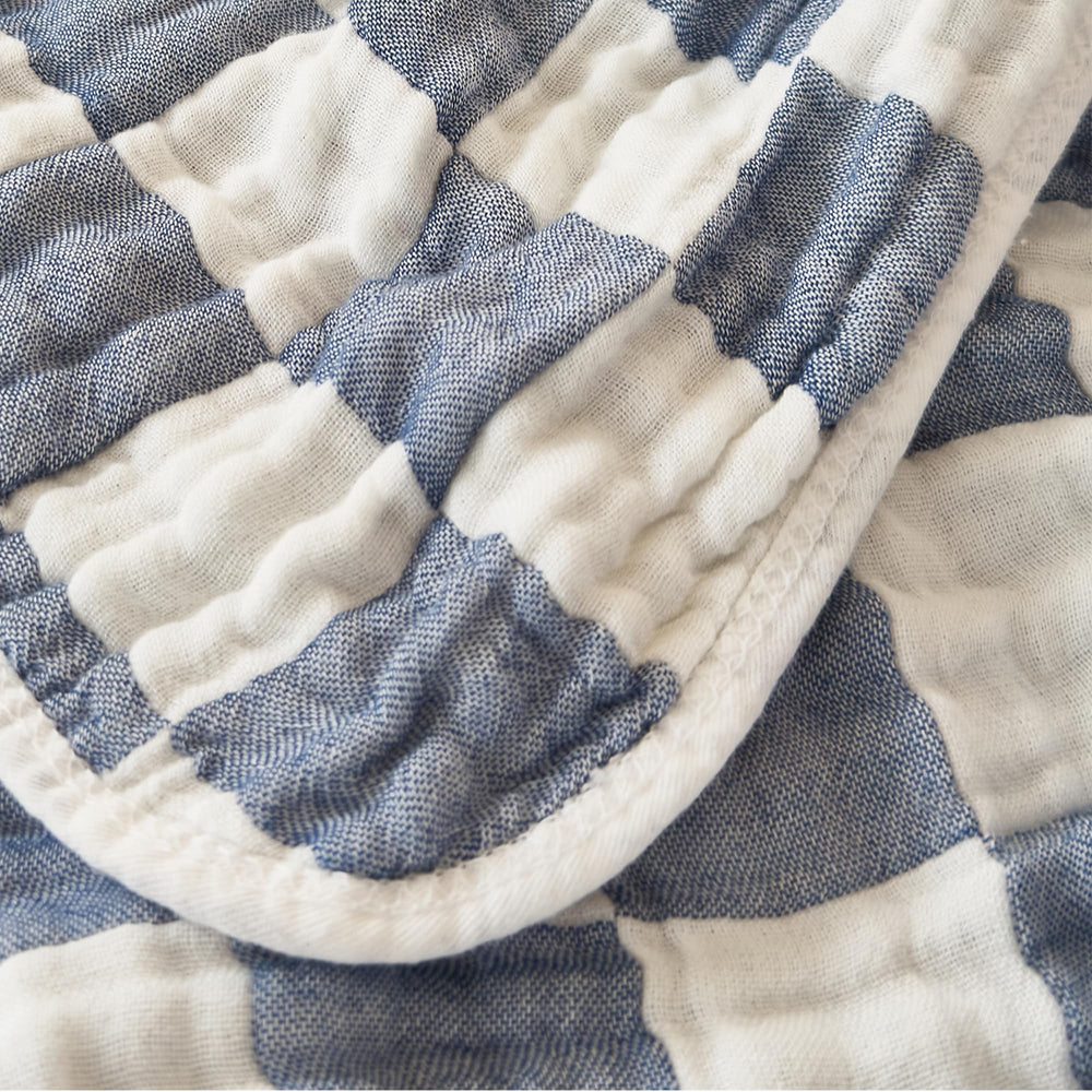 REPRECONF muslin blanket tummy-time mat for soft play.