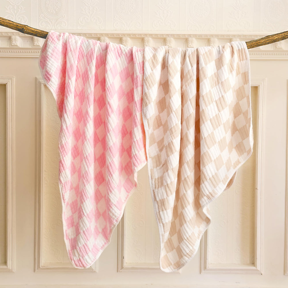REPRECONF two-pack muslin blankets shown folded, highlighting convenient spare on wash days