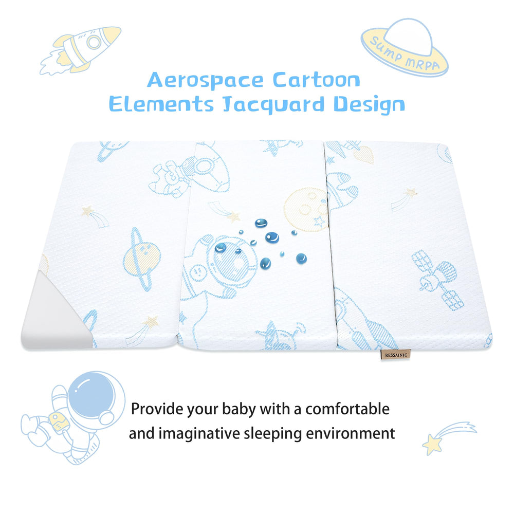 Ressainic Pack and Play mattress cover close-up showing soft fabric texture