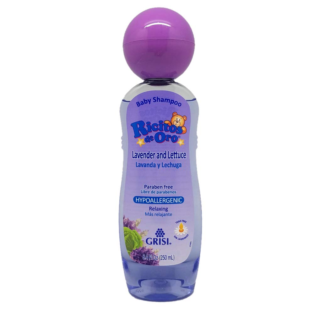 Ricitos de Oro Lavender Baby Shampoo bottle pour demonstrates gentle cleansing for delicate hair.