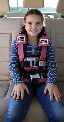 RideSafer XS pink vest shows lightweight travel-friendly design for families on the go