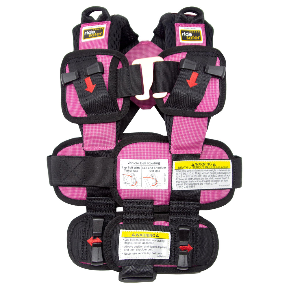 RideSafer XS pink vest in car seat for secure travel