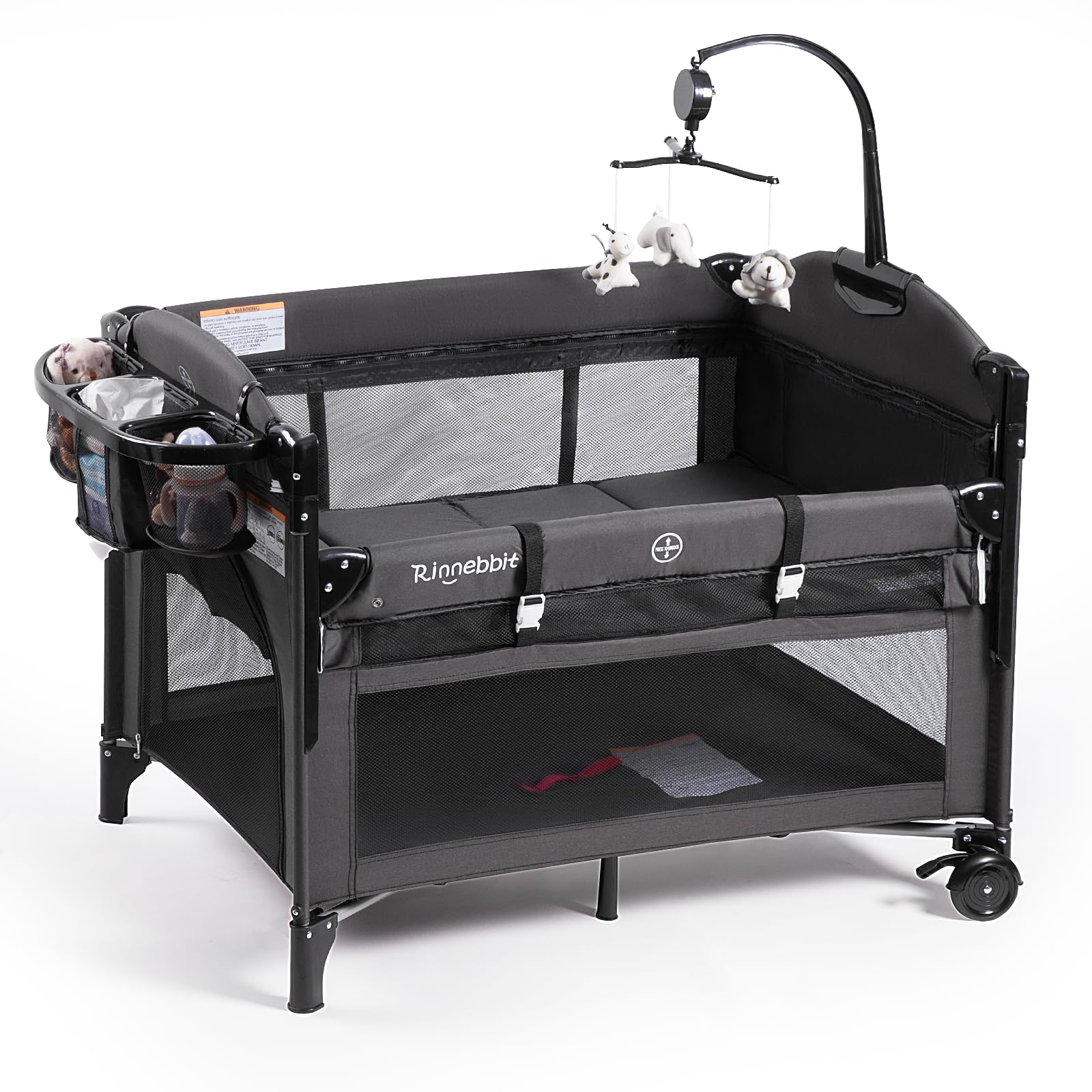 Rinnebbit bedside sleeper attached to bed for easy night nursing.