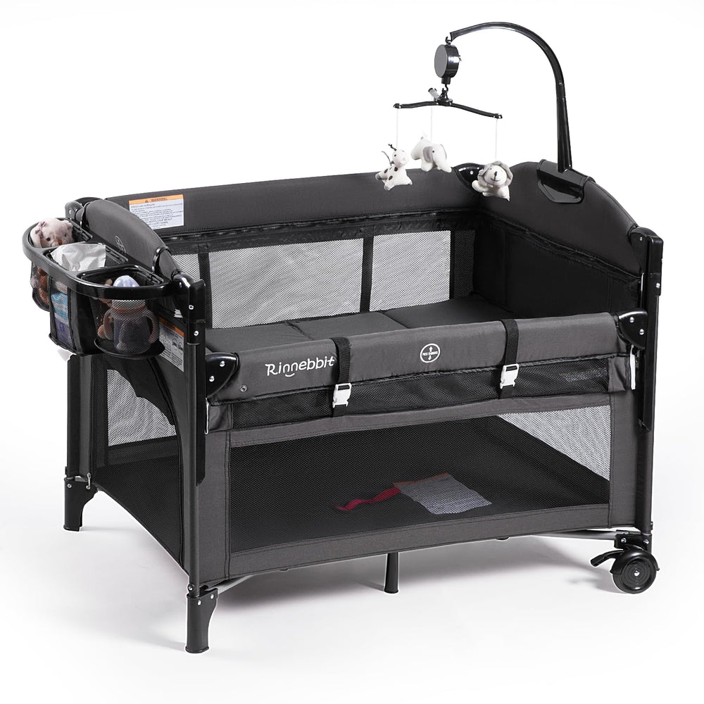 Rinnebbit bedside sleeper attached to bed for easy night nursing.