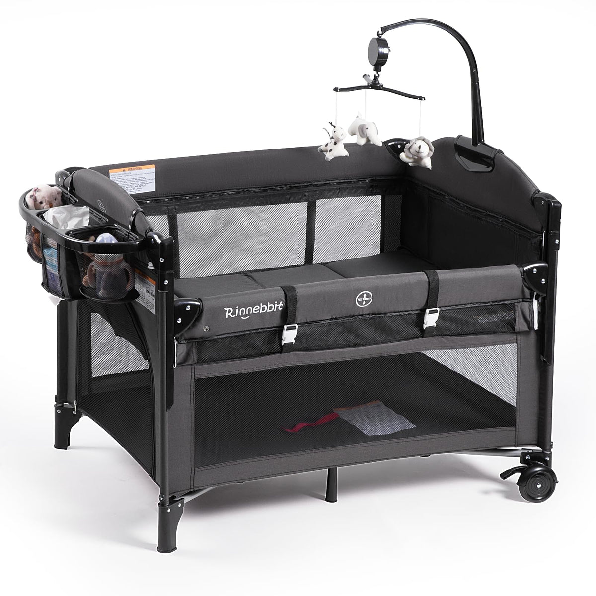 Rinnebbit bedside sleeper attached to bed for easy night nursing.
