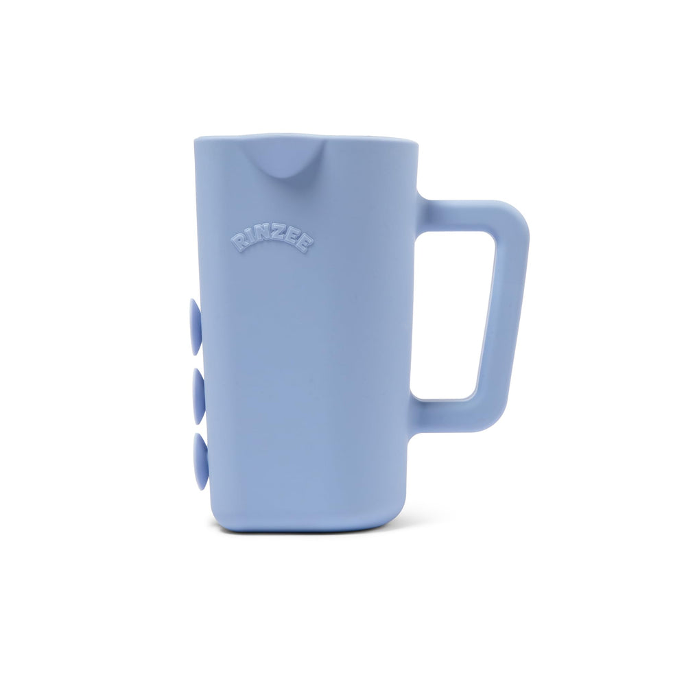 Rinzee bath cup drains water upside down, reducing tub clutter during bath time.