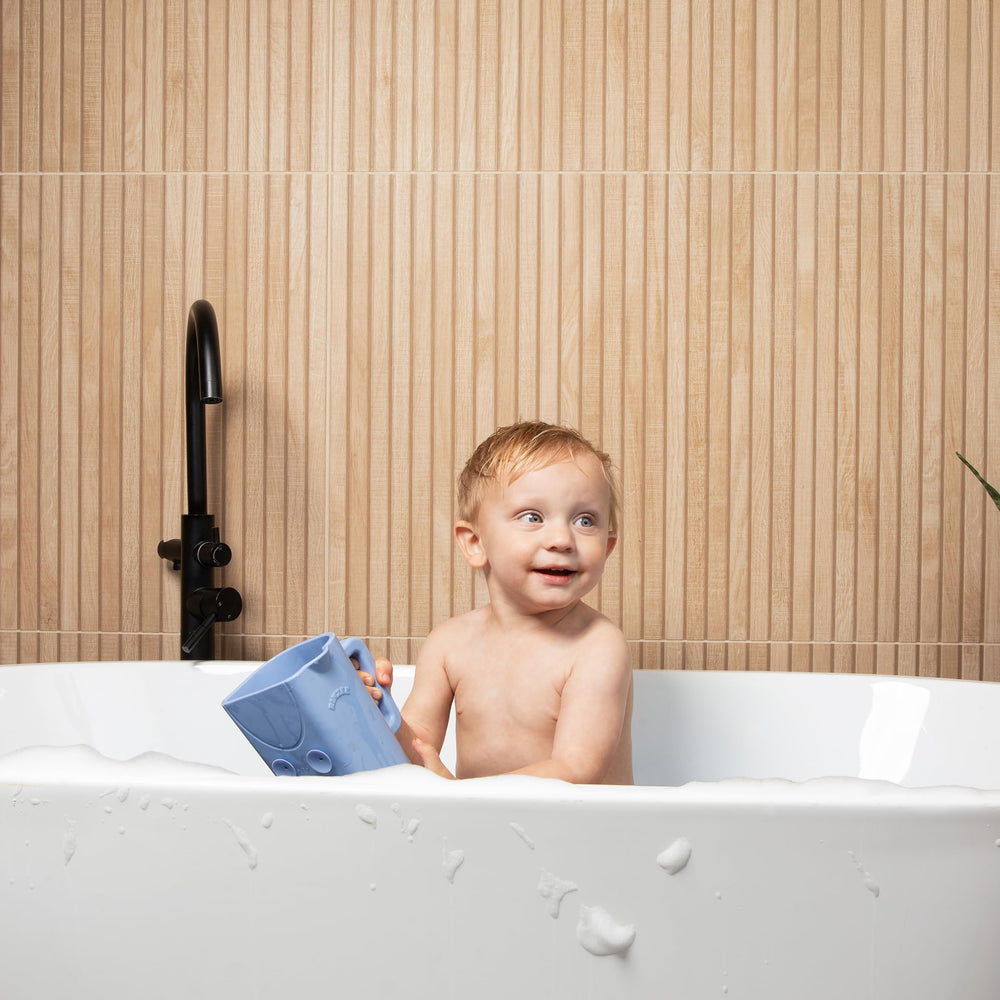 Rinzee kids learning tool promotes sensory play with stacking and popping on tiles.