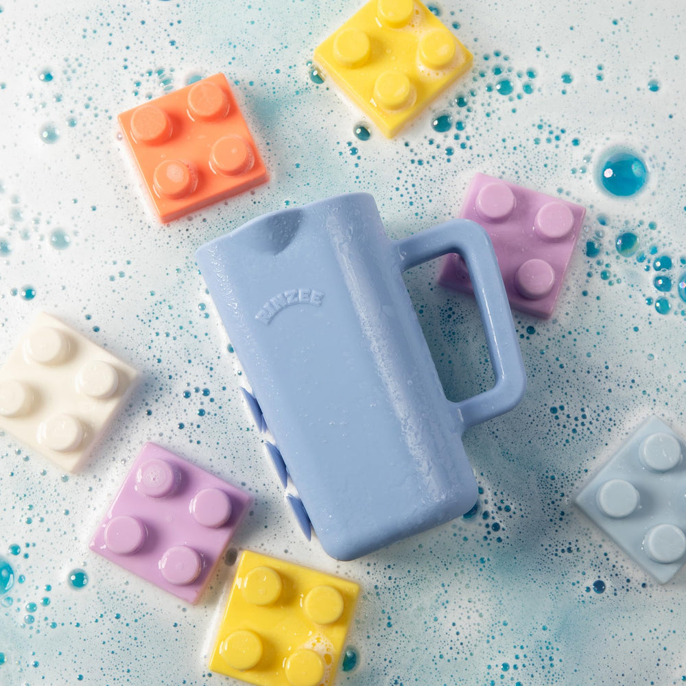 Rinzee bath cup sticks to tiles, helping keep bath area neat and accessible.