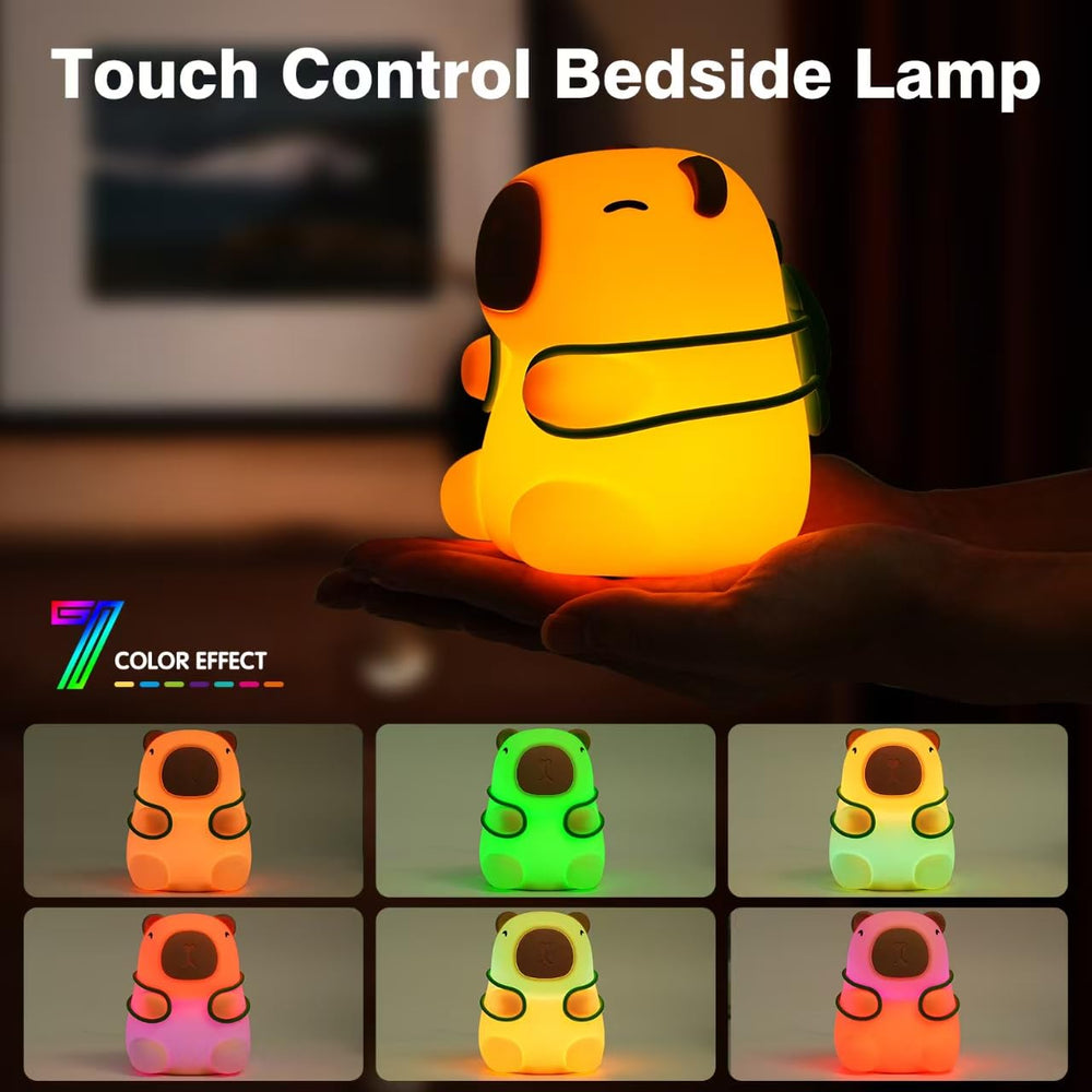 Rktnorv Capybara Night Light in dimming mode for cozy reading.