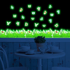 Robmoda glow green grass wall stickers illuminate softly for a playful room transformation.