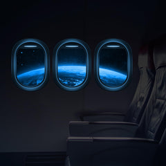 Robmoda glow-in-the-dark space decals glow on wall for bedtime imagination.