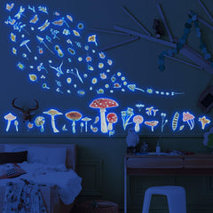Robmoda glow mushroom wall decal in blue glows softly for enchanting nursery walls