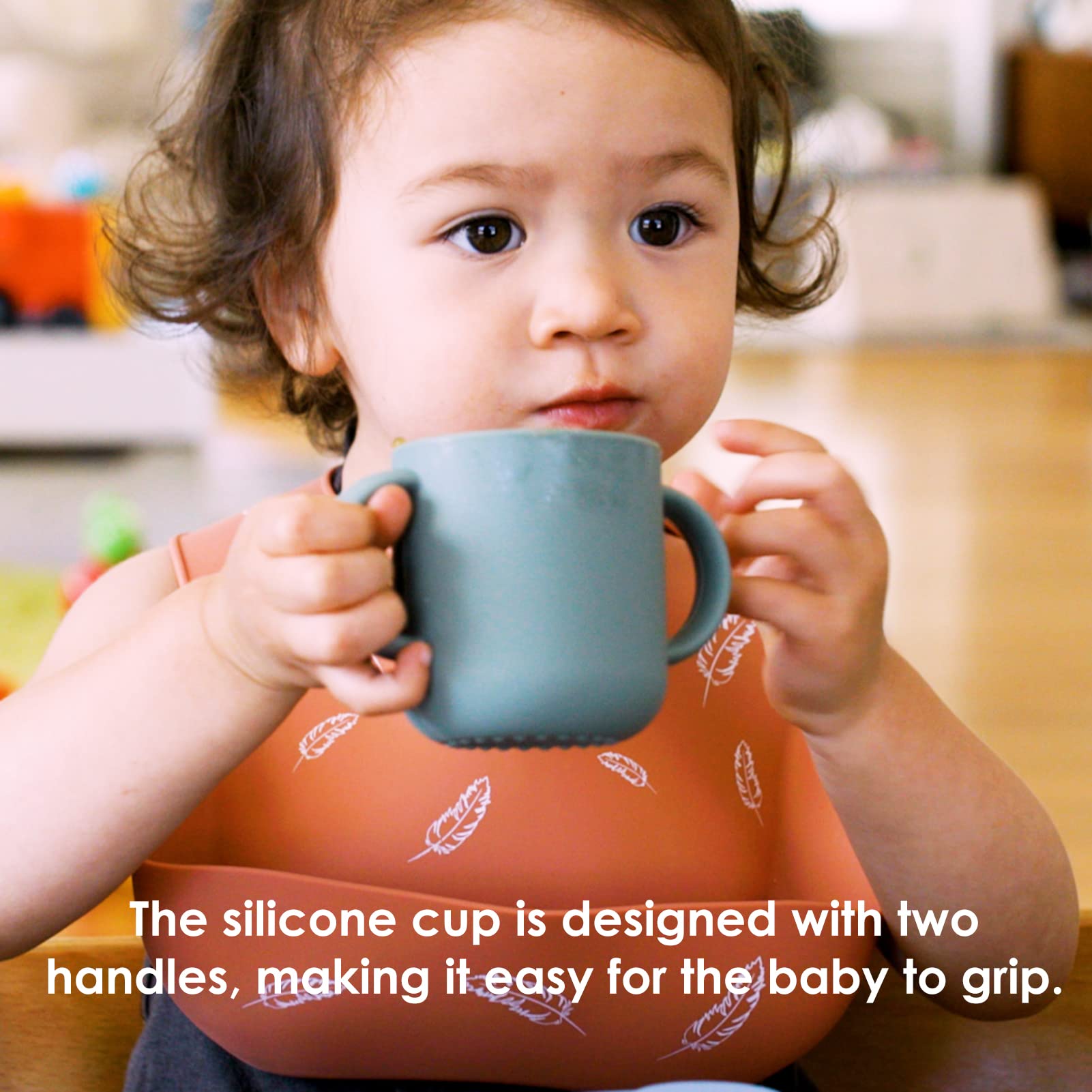 ROCCED baby learning cup features soft rim for gentle sipping.