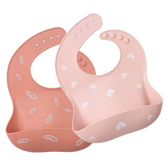 ROCCED baby silicone bib soft pink closeup highlights skin-friendly finish for feeding