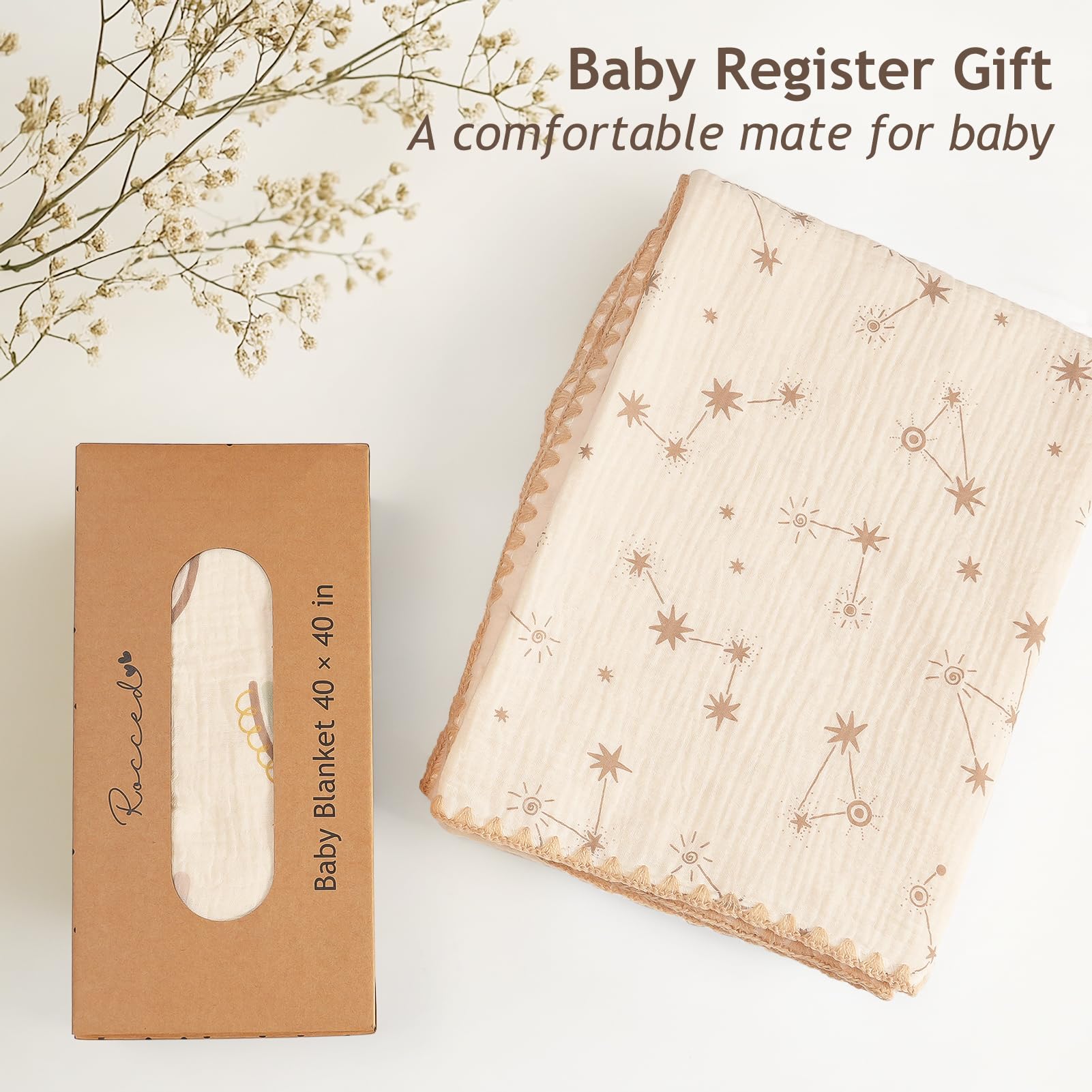 ROCCED blanket doubles as swaddle, nursing cover, crib blanket, and play mat.