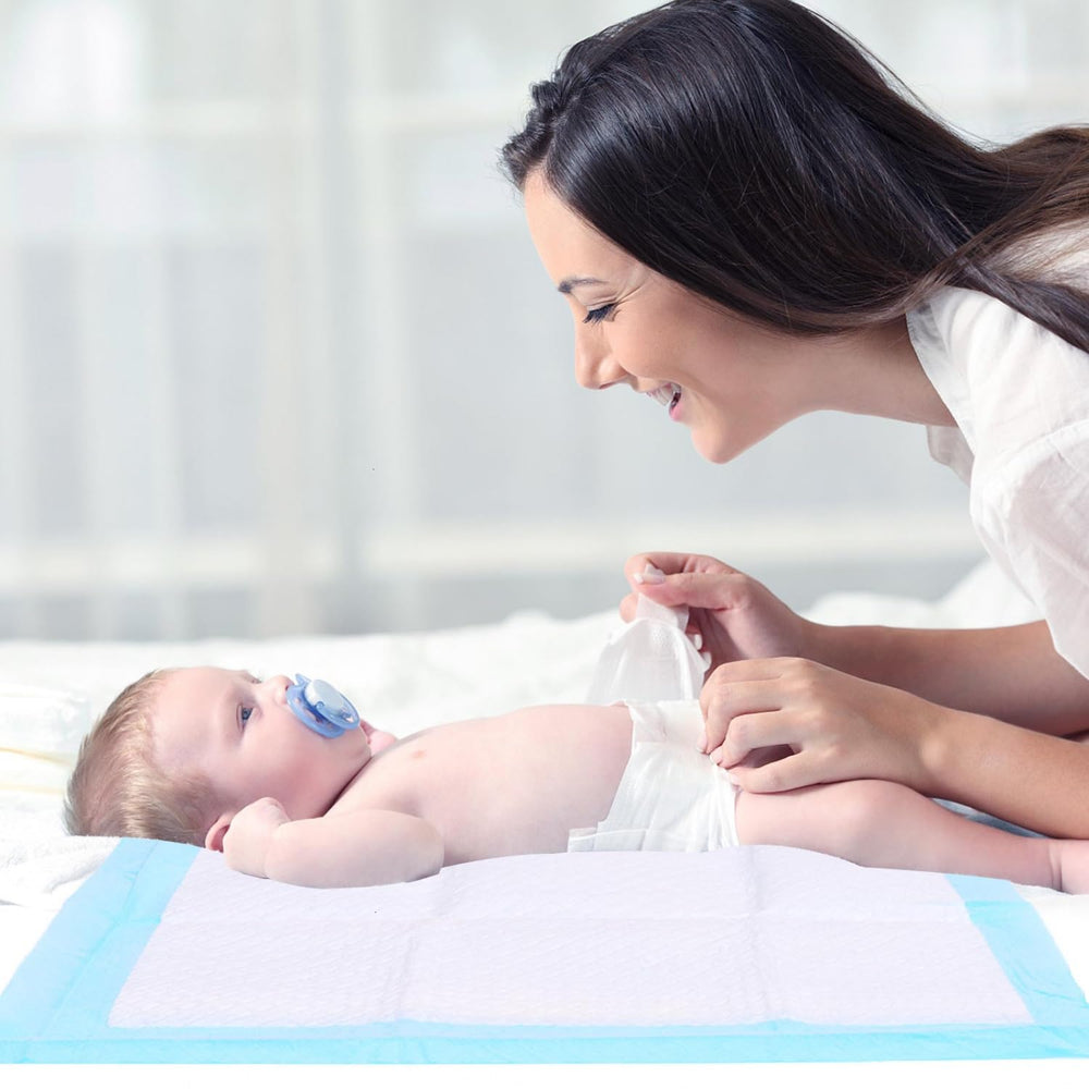 Rocinha absorbent underpad with fast-dry surface for mess-free changes.