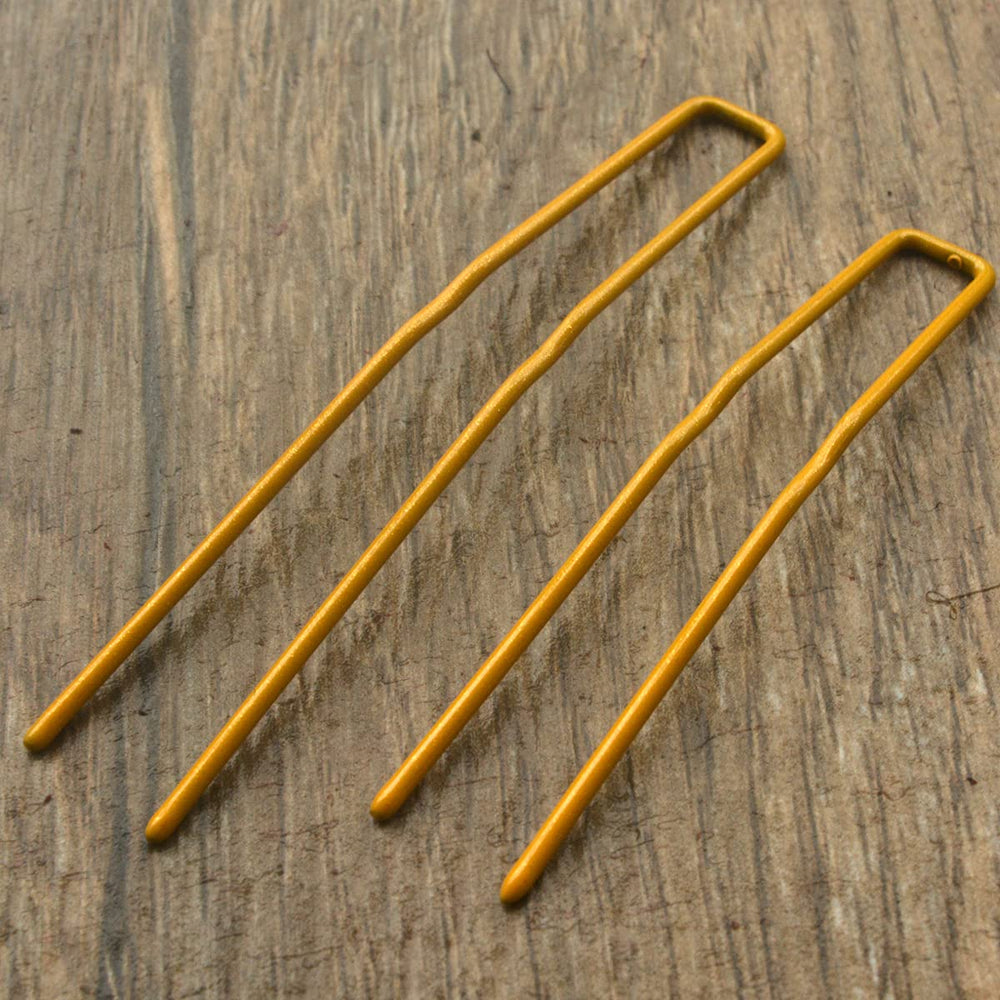ROCST 2-5inch blonde pins pack12 providing secure hold for fine hair.
