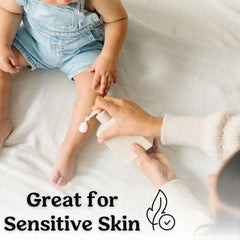 Roe Wellness fragrance-free baby lotion texture close-up shows quick-absorption consistency.