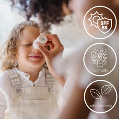 Roe Wellness Baby Sunscreen Stick on baby's face for easy coverage on cheeks and nose.