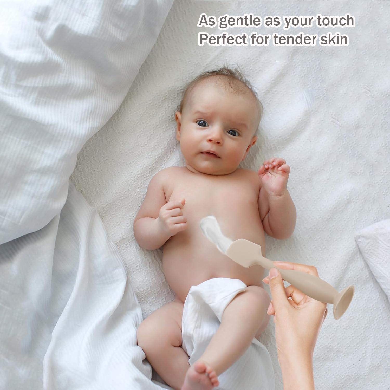 ROHISOM suction-base spatula enables hands-free diaper changes.
