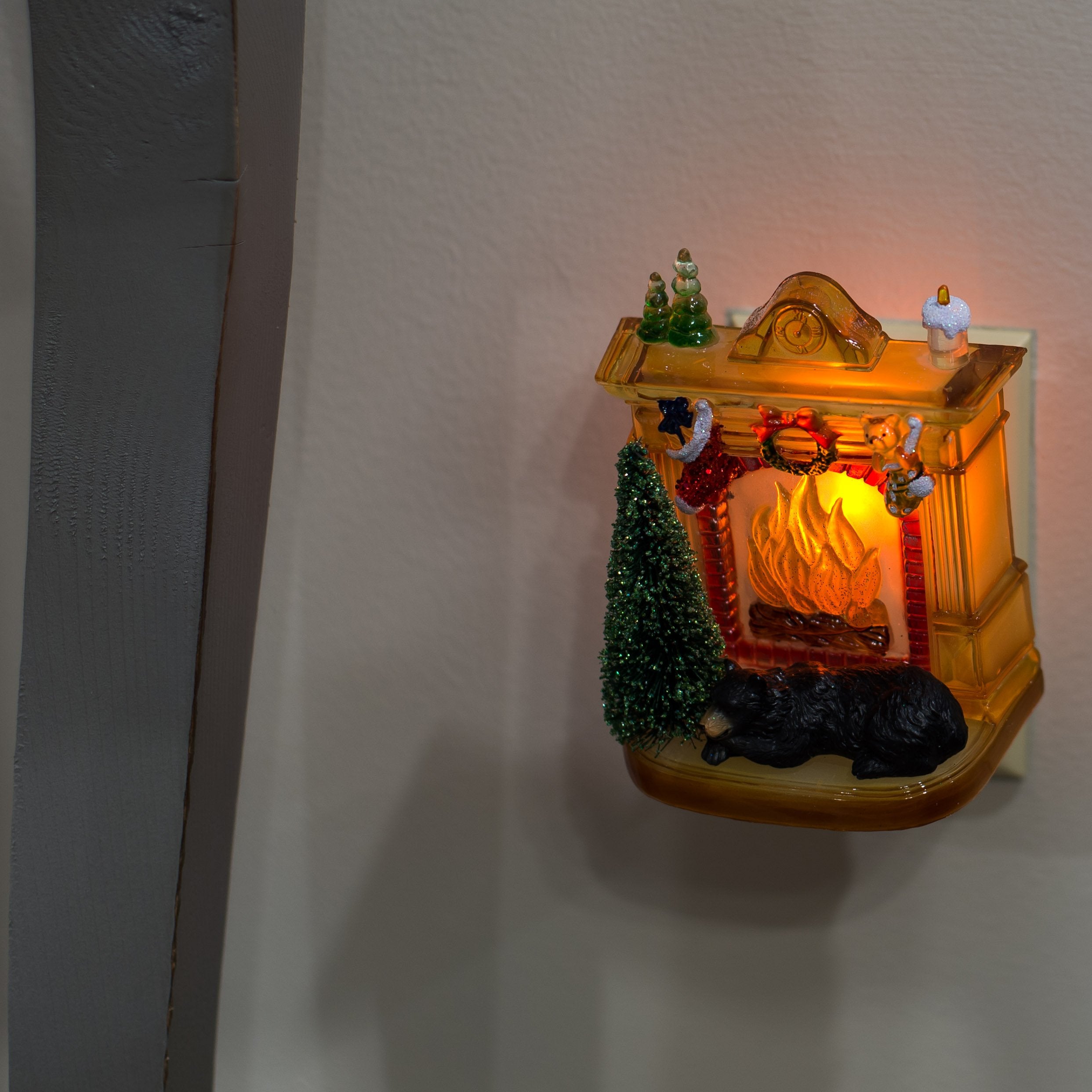 Roman Sleeping Winter Bear night light swivel base demonstrates flexible outlet placement