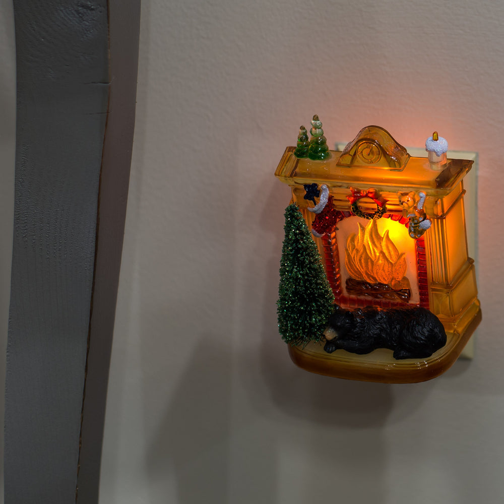 Roman Sleeping Winter Bear night light swivel base demonstrates flexible outlet placement