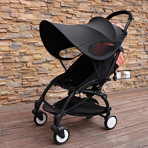 ROMIRUS sunshade extension installed on a YOYO stroller during a park walk.