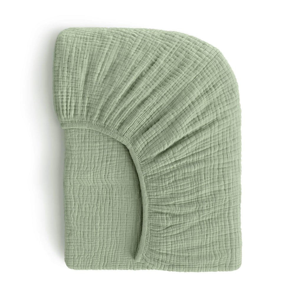 ROMY RO muslin crib sheet with soft, breathable fabric for cozy baby sleep.