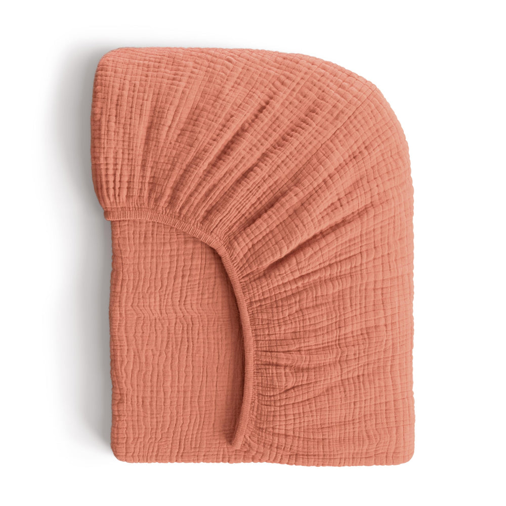 ROMY RO muslin crib sheet with soft, breathable fabric for delicate baby skin during naps.