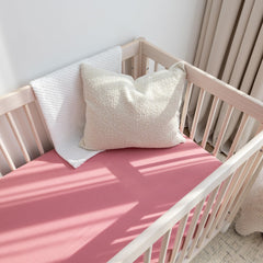 ROMY RO Muslin crib sheet—easy cleaning and color retention after washing.