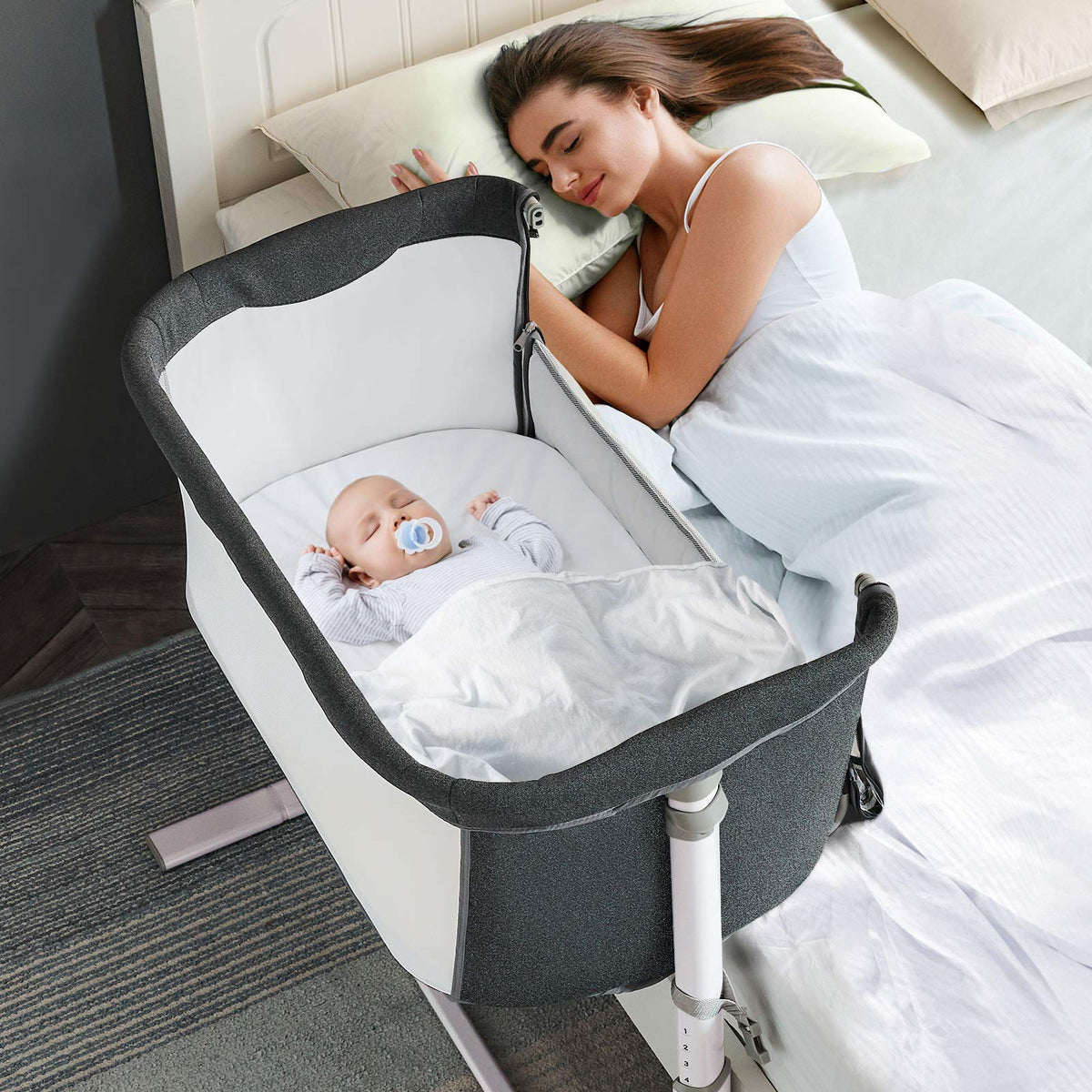 RONBEI baby bassinet bedside closeup shows compact frame for bedside sleep.