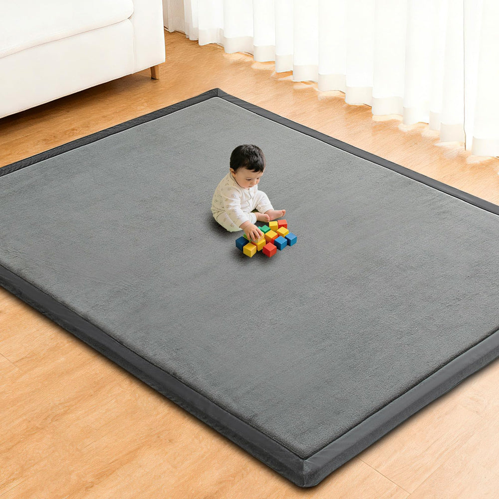 RONGFA baby play mat tummy-time closeup shows ultra-soft coral velvet surface for comfort