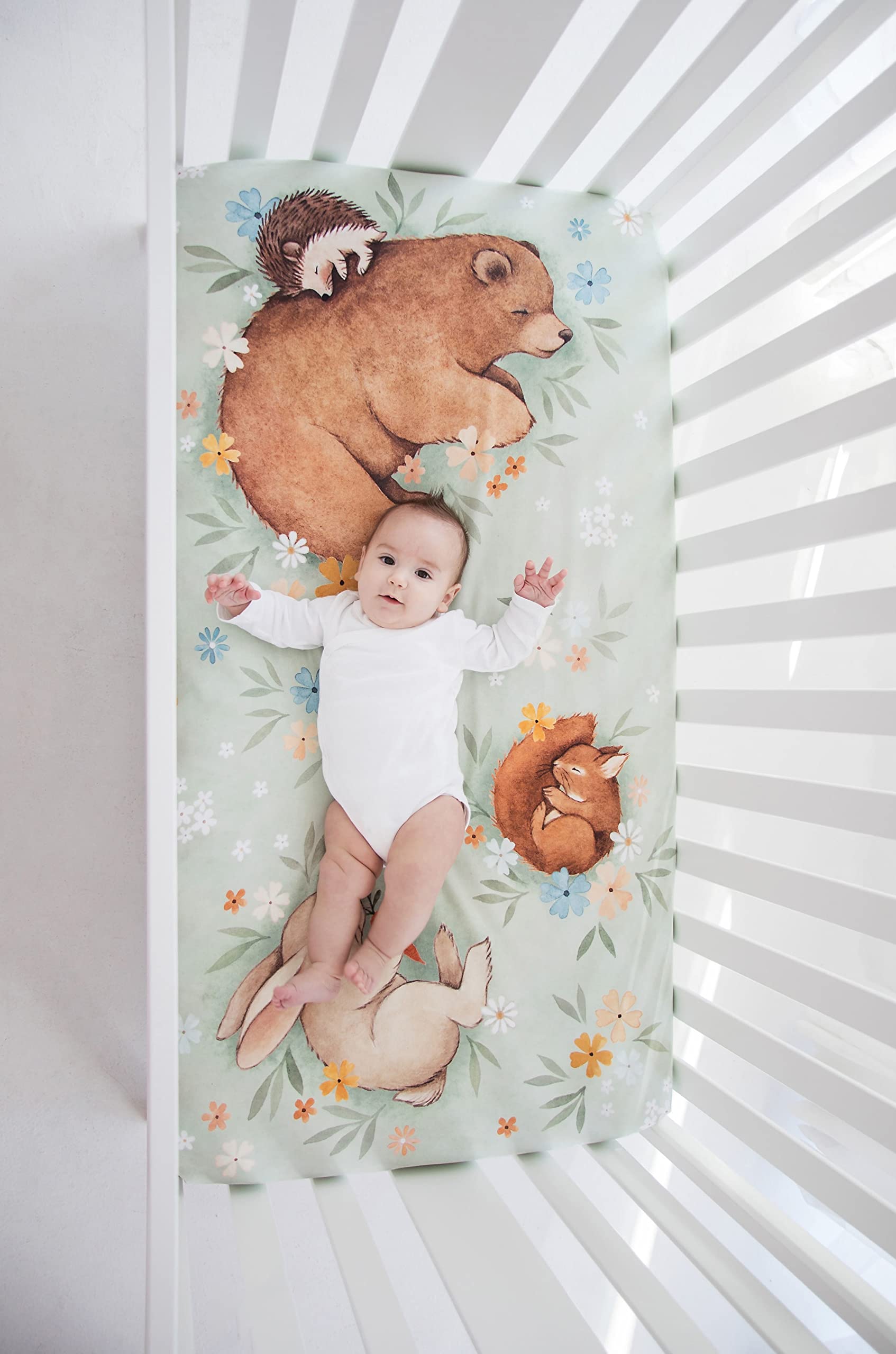 Rookie Humans Enchanted Meadow crib sheet with fitted elastic ensures a smooth sleep surface.