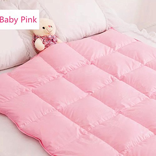 ROSE FEATHER crib-travel blanket in use on a stroller or car seat for on-the-go warmth.