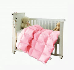 Rose Feather toddler-down blanket on crib showing breathable warmth for naps