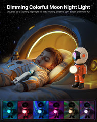 Rossetta Astronaut Galaxy Projector dimmable moon light adds soft nighttime glow.