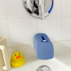 Roslim universal-fit faucet cover shows minimalist design that stays put.