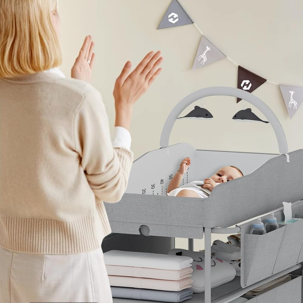 ROUTTOON diaper station in-use with baby highlighting safe, convenient changing setup.
