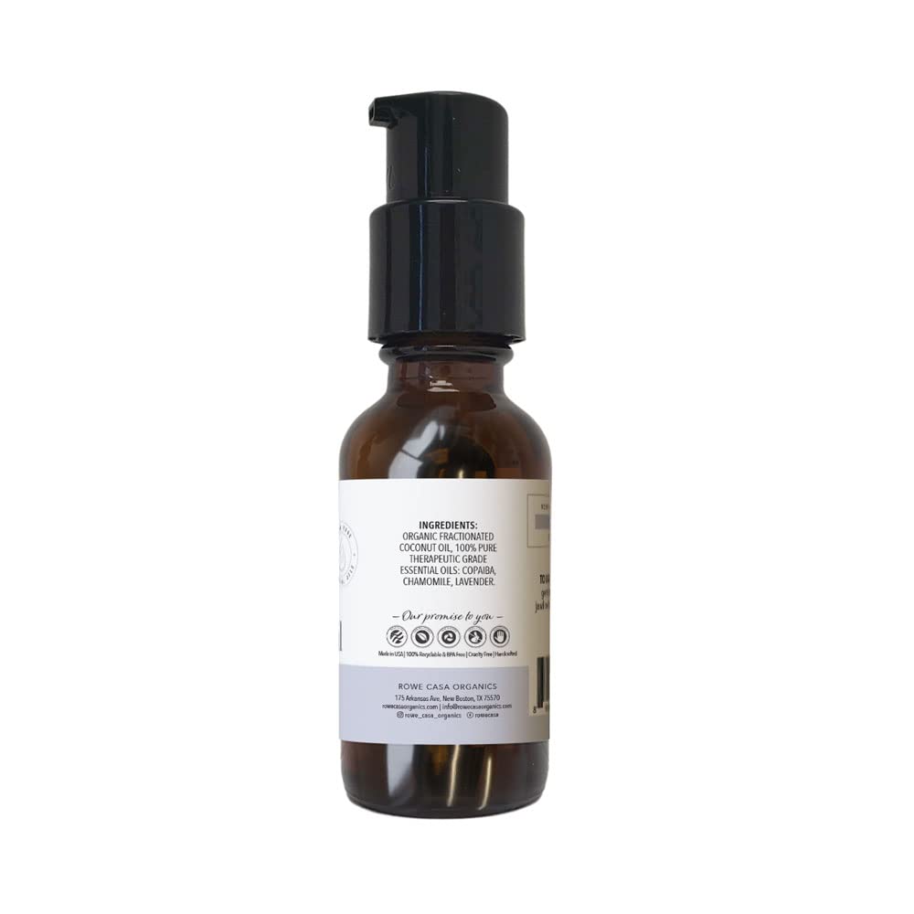 Rowe Casa Organics teething oil being massaged onto baby gums for soothing relief