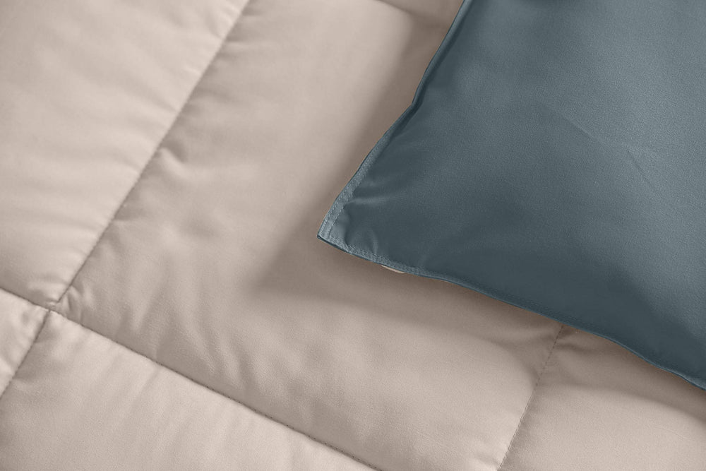 Royal Hotel Bedding reversible baby blanket taupe-navy folded for cozy car or stroller use