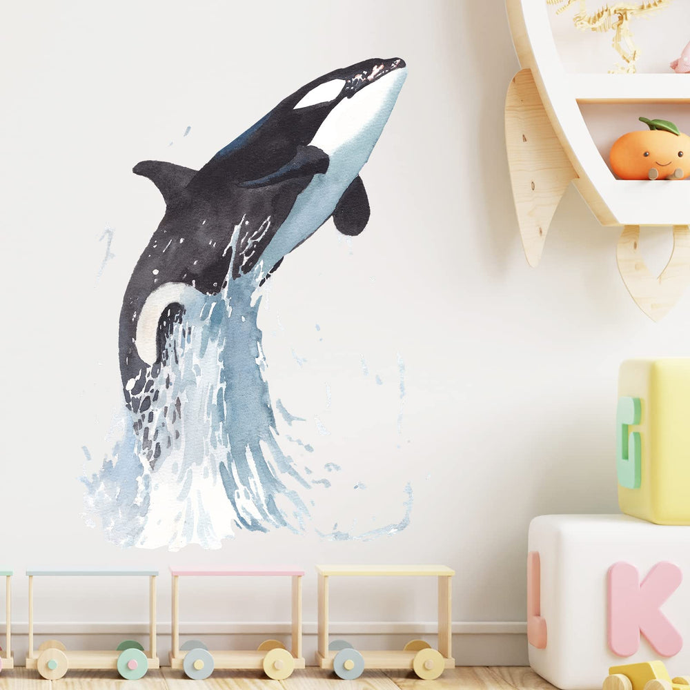 RoyoLam whale wall decal bright splash on wall, ideal for playroom inspiration.