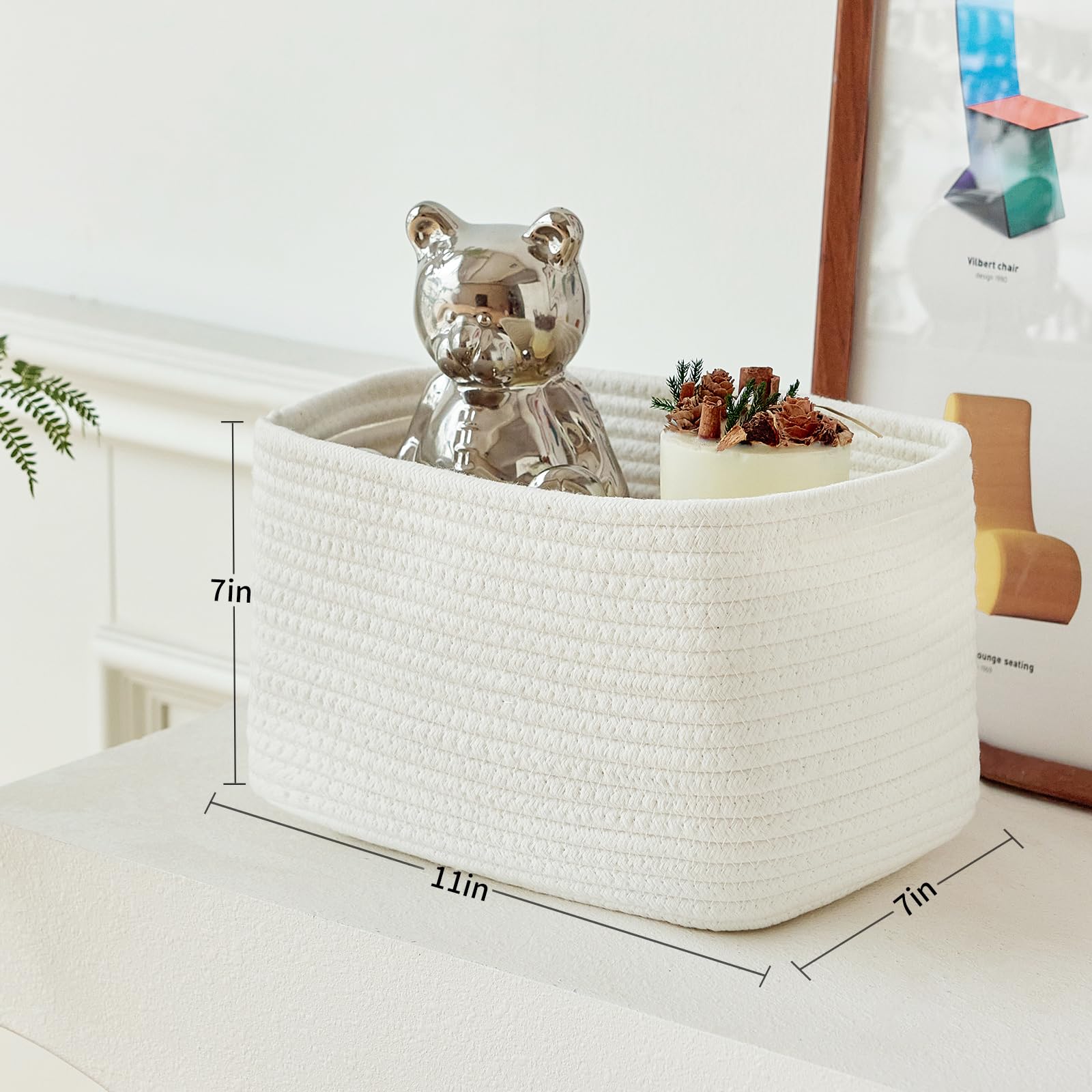R RUNKA basket on dining-room shelf adds neutral storage style.