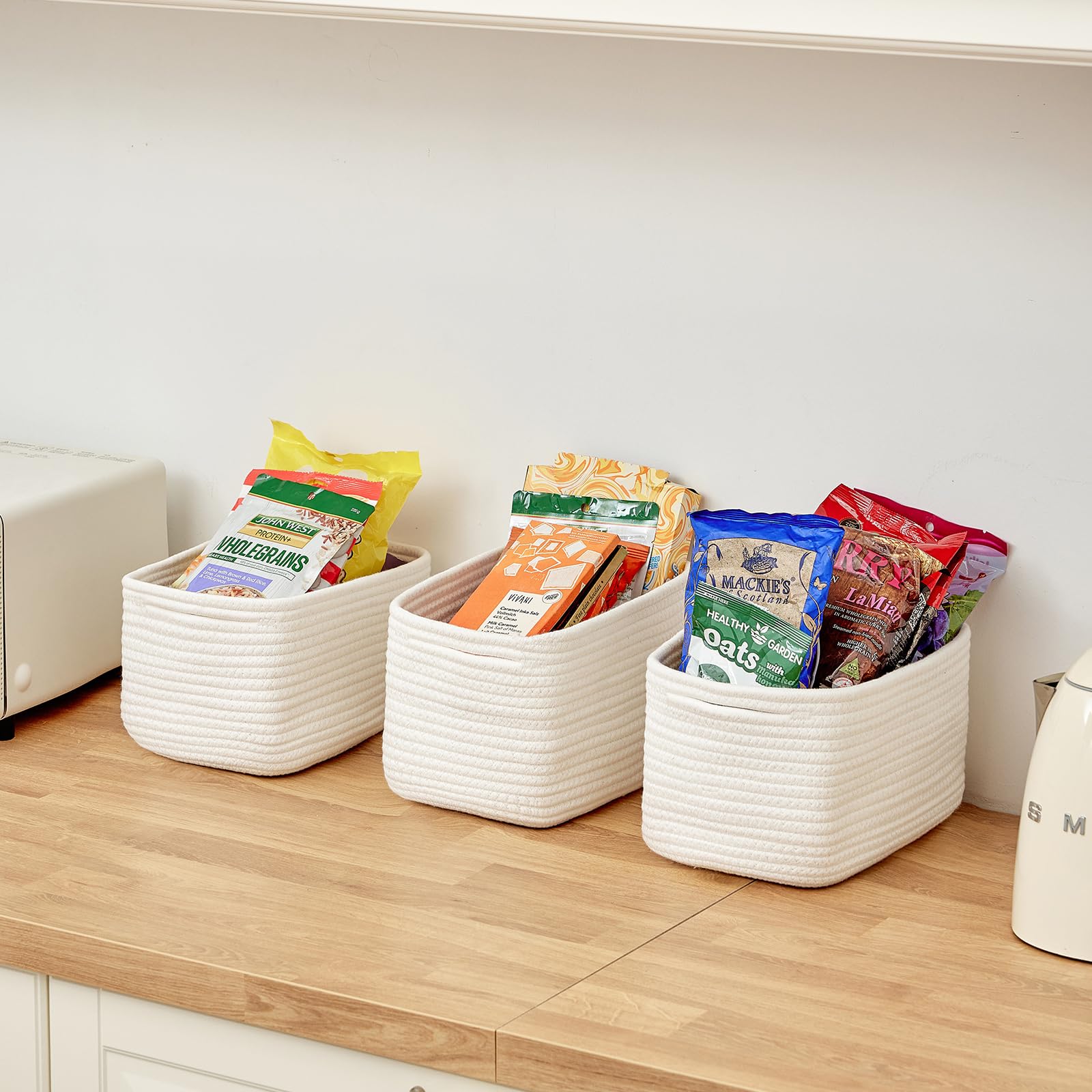 R RUNKA basket with handles for portable counter organization.