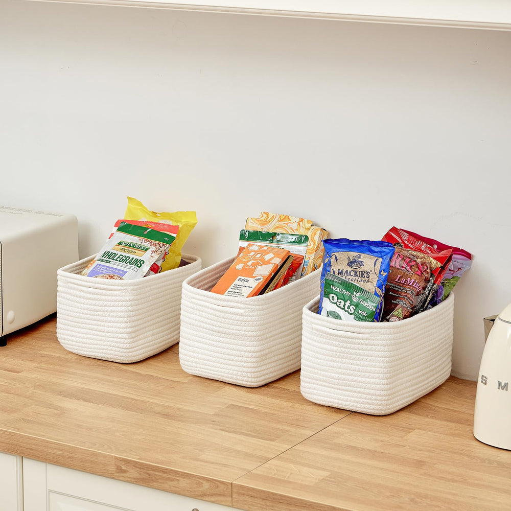 R RUNKA basket with handles for portable counter organization.