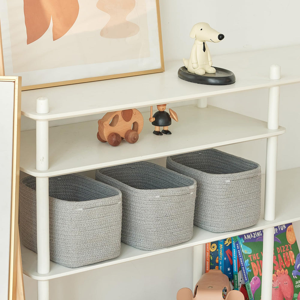 R RUNKA on a shelf holds toiletries neatly for quick bathroom organization.