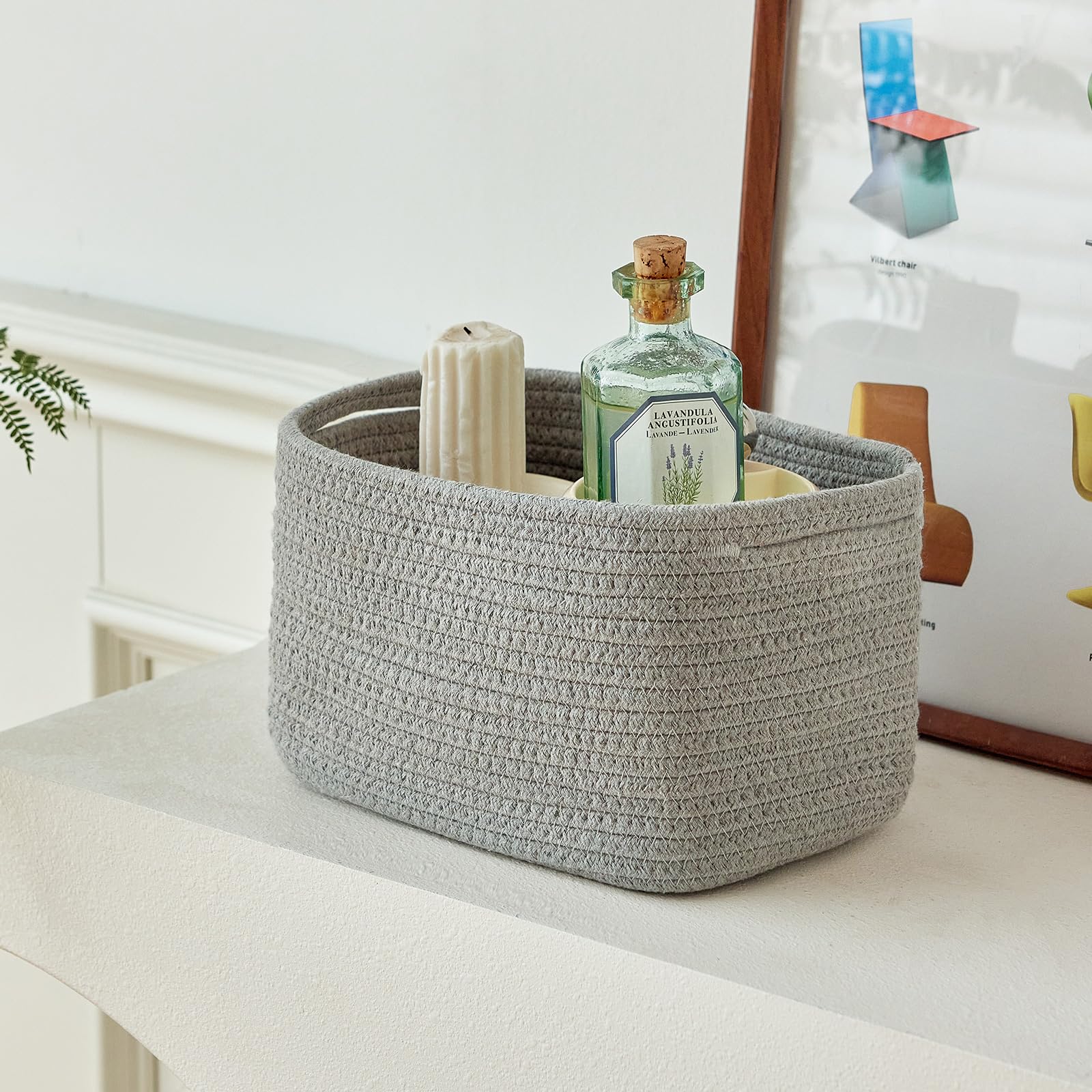 R RUNKA basket keeps small toys organized on a shelf.